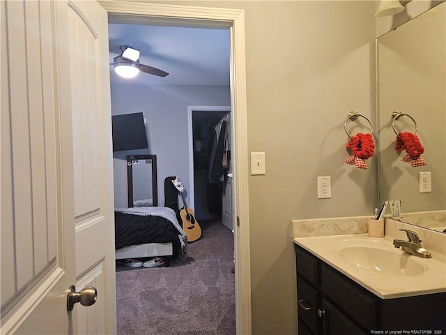 bathroom with vanity and ceiling fan