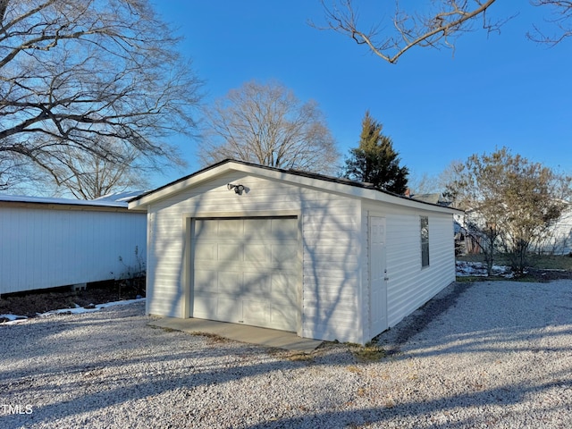 212 Craig Ave, Henderson, NC 27537 - detached garage featuring gravel driveway