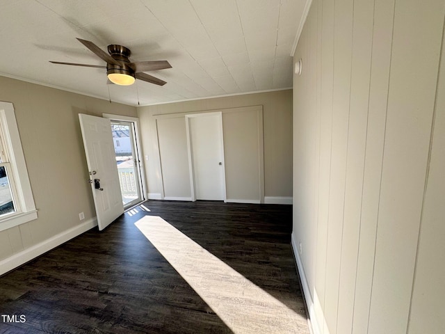 212 Craig Ave, Henderson, NC 27537 - entryway with baseboards, dark wood finished floors, a ceiling fan, and crown molding
