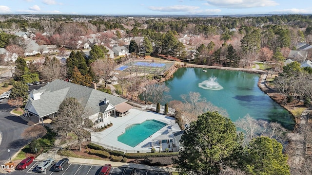 bird's eye view with a water view and a residential view