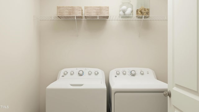 laundry area with washer and clothes dryer