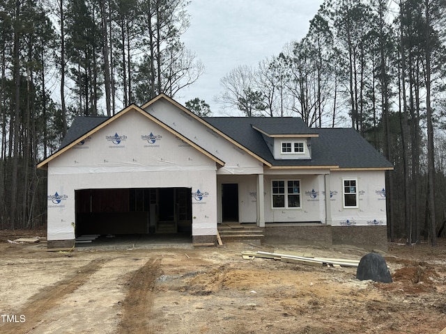 property under construction featuring a garage