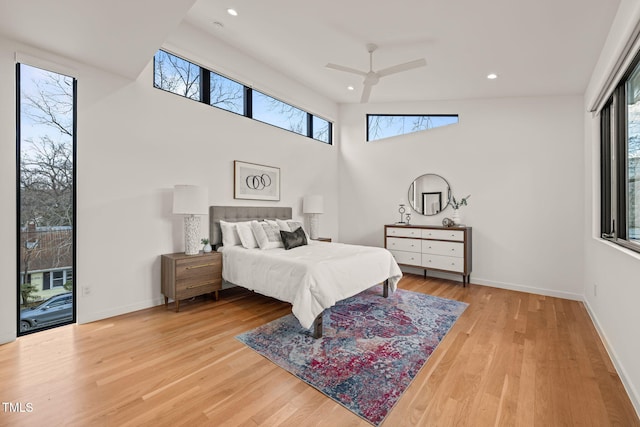 bedroom with access to exterior, recessed lighting, ceiling fan, wood finished floors, and baseboards