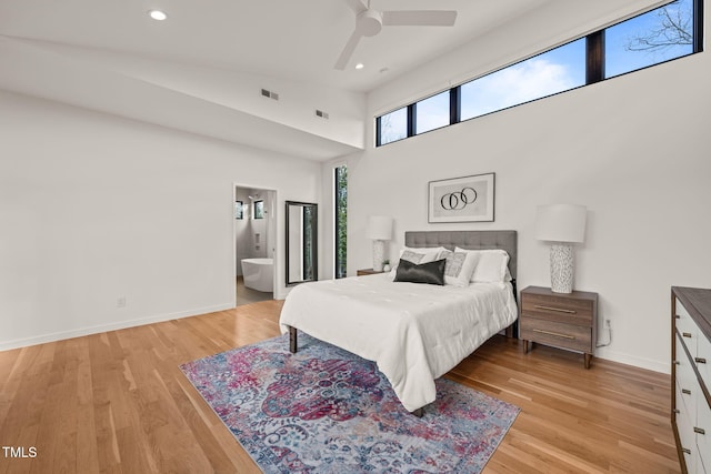 bedroom with recessed lighting, visible vents, light wood-style flooring, and baseboards