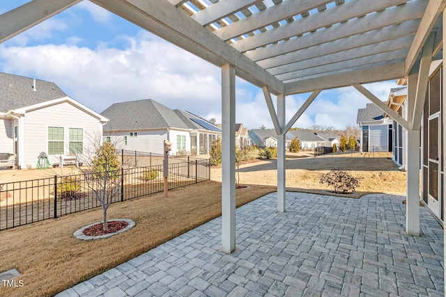 view of patio / terrace with a fenced backyard, a residential view, and a pergola