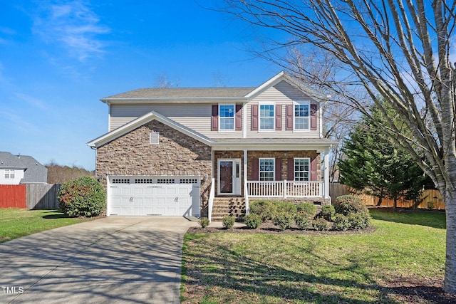 view of front of property featuring covered porch, a front lawn, and a garage