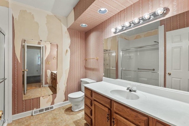 620 Mcghees Mill Rd, Roxboro, NC 27574 - full bathroom featuring visible vents, vanity, toilet, wallpapered walls, and a shower with shower door