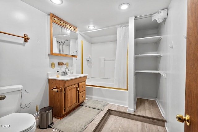 620 Mcghees Mill Rd, Roxboro, NC 27574 - full bath with recessed lighting, wood finished floors, toilet, and vanity