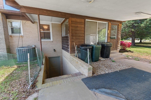 620 Mcghees Mill Rd, Roxboro, NC 27574 - property entrance with central air condition unit and brick siding