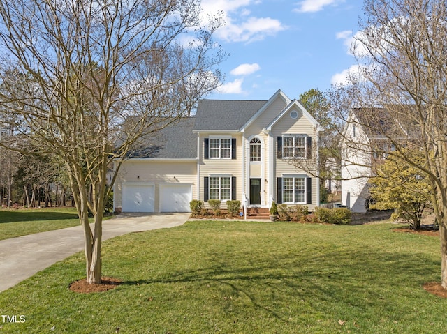 view of front of property with a garage, driveway, roof with shingles, and a front yard