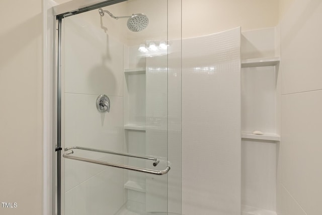 full bathroom featuring a shower stall