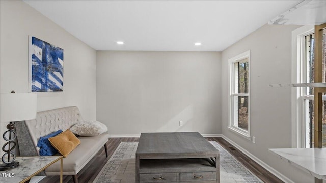 sitting room featuring dark wood-style floors, recessed lighting, and baseboards