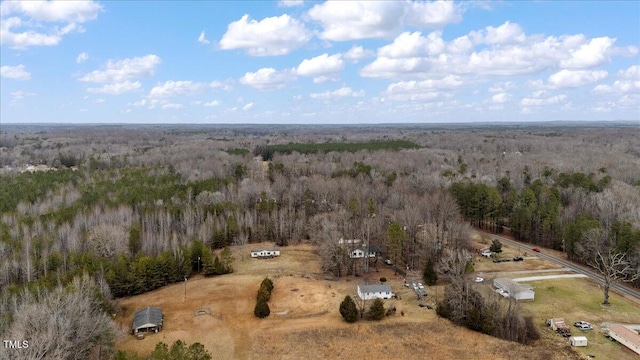 bird's eye view featuring a forest view