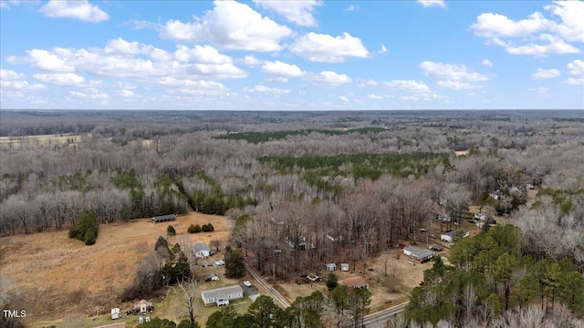 aerial view featuring a view of trees