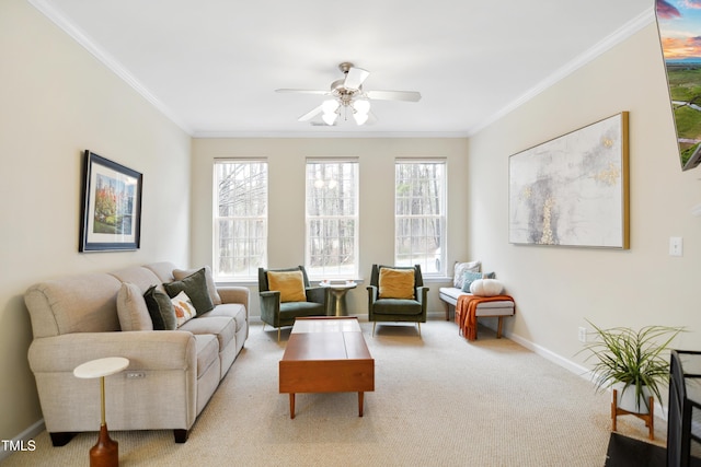 living room featuring ornamental molding, light colored carpet, and baseboards