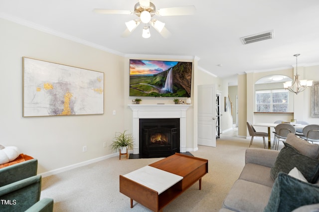 living room with visible vents, crown molding, and light colored carpet