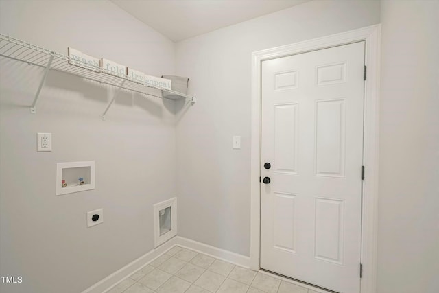 laundry area featuring light tile patterned floors, hookup for a washing machine, hookup for an electric dryer, laundry area, and baseboards