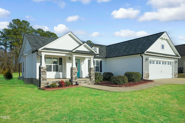 view of front of home with driveway, stone siding, a porch, and a front yard