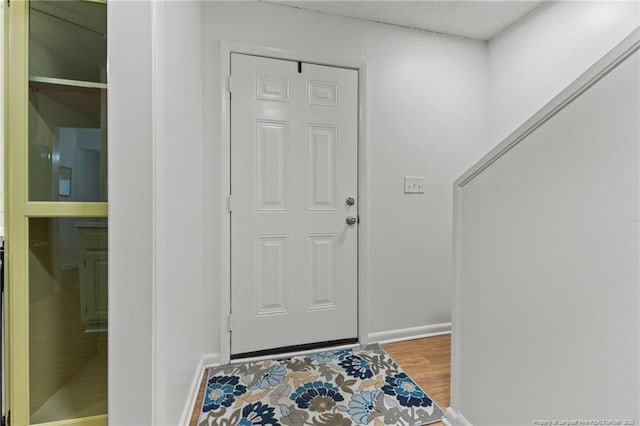 doorway to outside featuring hardwood / wood-style floors