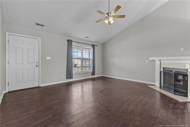 unfurnished living room featuring ceiling fan, high vaulted ceiling, and dark hardwood / wood-style flooring