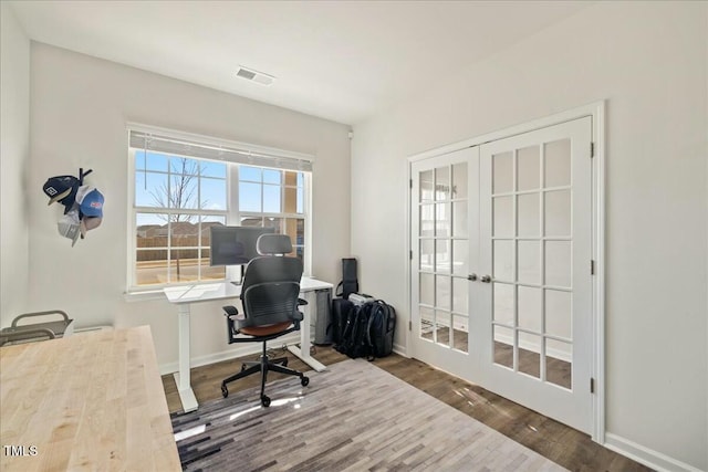 office area featuring dark wood-type flooring and french doors