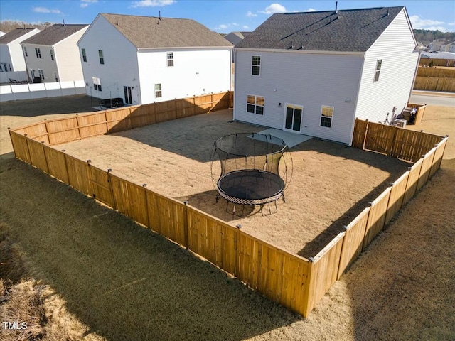 view of yard featuring a trampoline