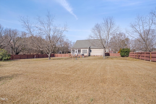 view of yard featuring a fenced backyard