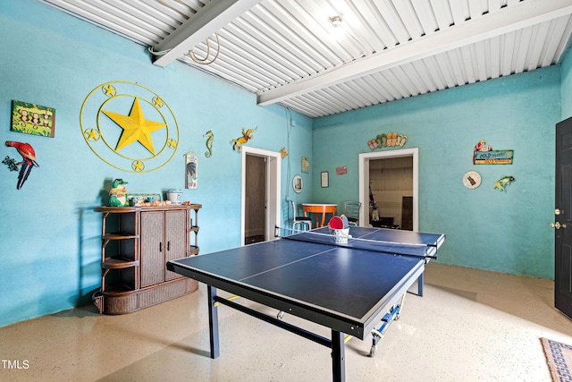 recreation room featuring speckled floor