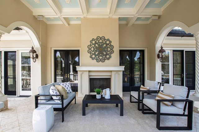 view of patio / terrace with an outdoor living space with a fireplace