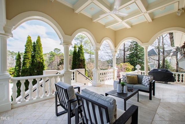 view of patio with area for grilling and an outdoor hangout area