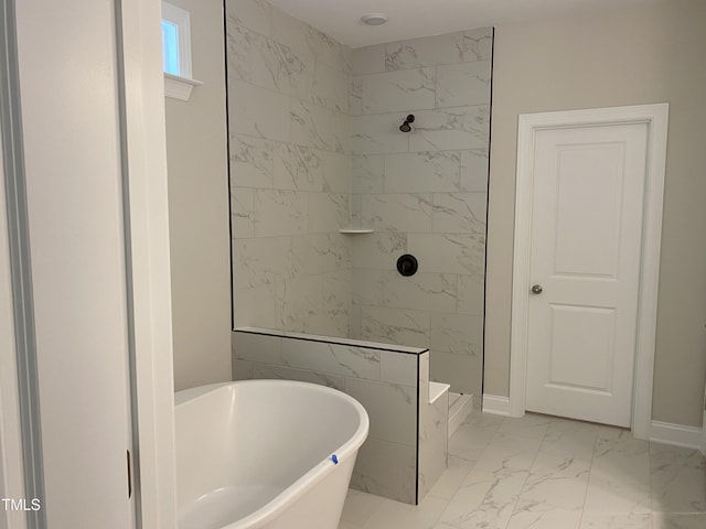 5036 Trotter Dr, Raleigh, NC 27603 - full bathroom featuring marble finish floors, a freestanding tub, and a tile shower