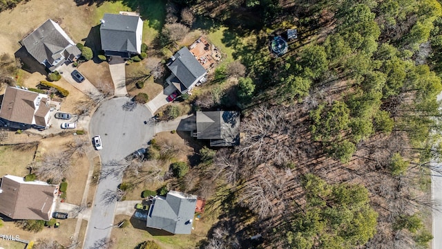 birds eye view of property with a residential view