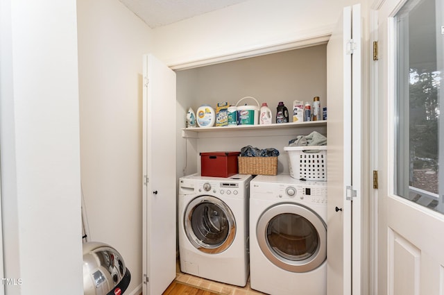 laundry room with washing machine and dryer and laundry area