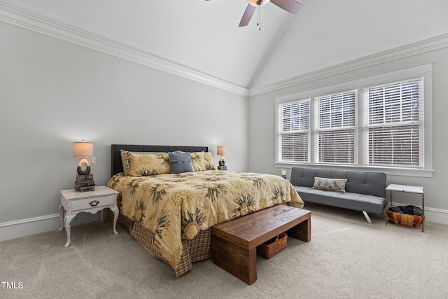 carpeted bedroom featuring baseboards, ceiling fan, high vaulted ceiling, and crown molding