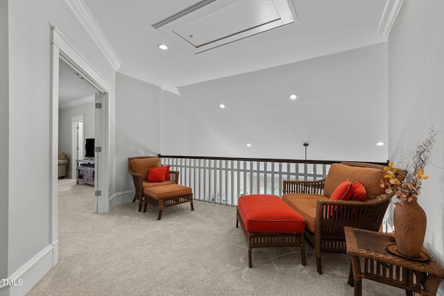 sitting room with recessed lighting, light colored carpet, ornamental molding, attic access, and baseboards