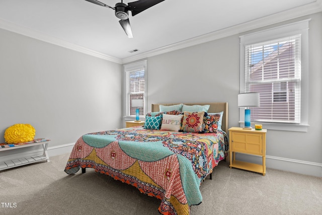 bedroom featuring carpet floors, crown molding, and baseboards