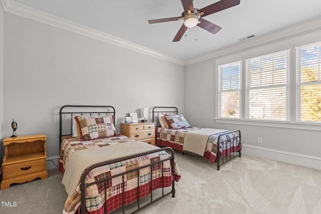 bedroom with light carpet, multiple windows, visible vents, and crown molding