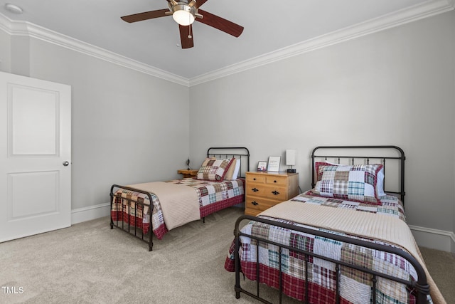 bedroom featuring light carpet, a ceiling fan, baseboards, and crown molding