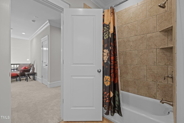 bathroom featuring shower / bathtub combination with curtain, ornamental molding, and baseboards