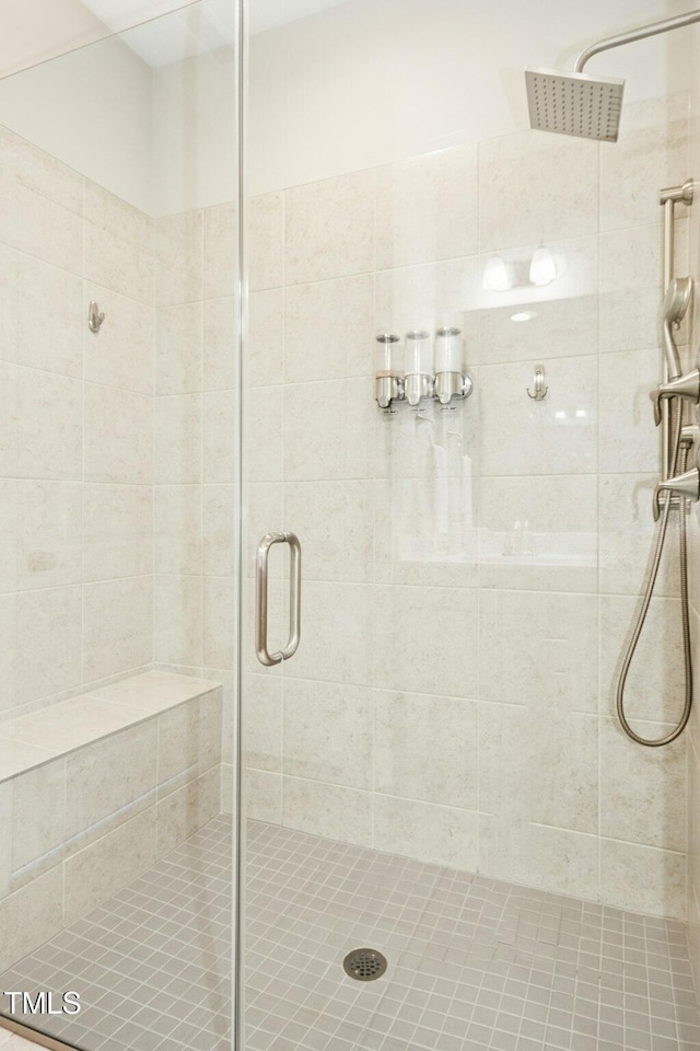 bathroom featuring a stall shower