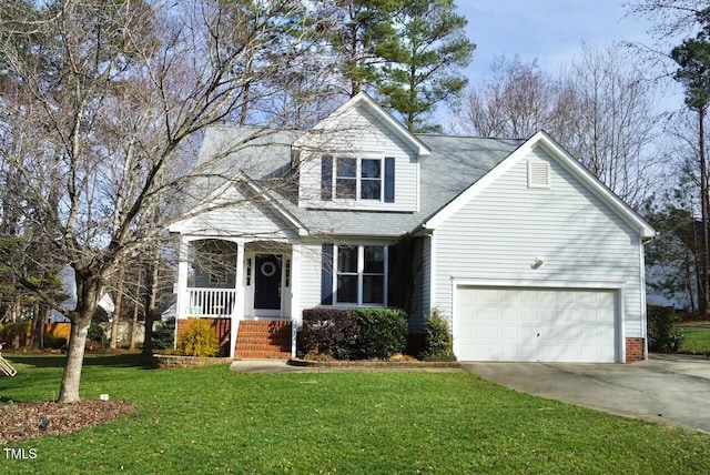 view of front facade with a garage, a front lawn, and concrete driveway