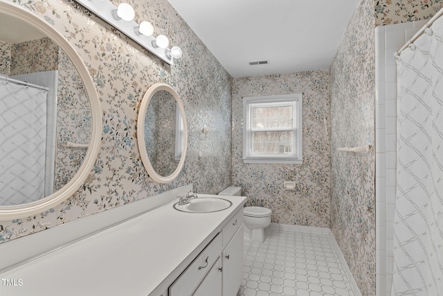 full bath featuring visible vents, toilet, vanity, tile patterned flooring, and wallpapered walls