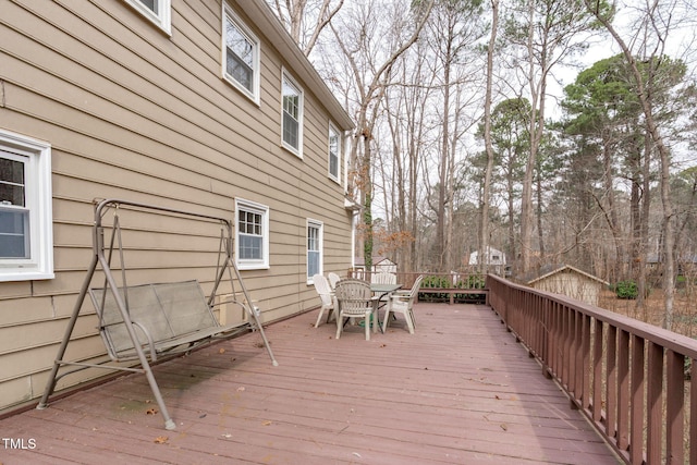 deck featuring outdoor dining space