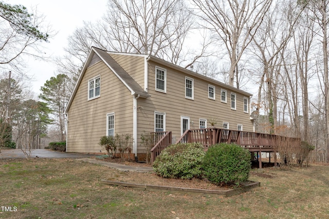 back of property with a deck