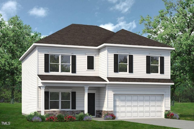 view of front of home featuring a garage and a front lawn