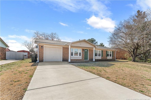 ranch-style home with a garage and a front yard