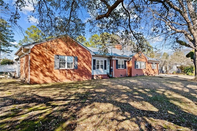 ranch-style home with a front yard