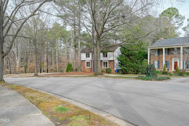 view of road featuring curbs and sidewalks