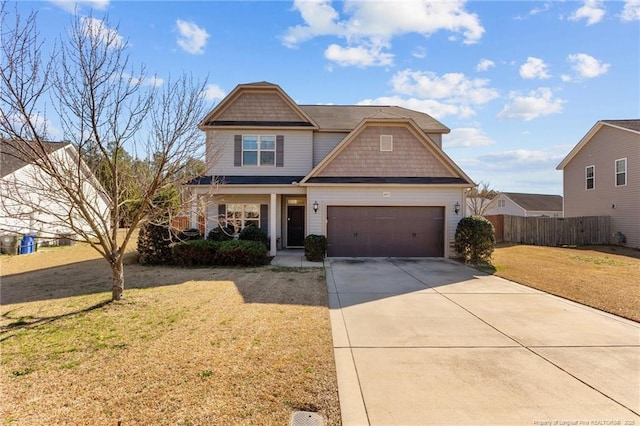 craftsman-style home with a front yard