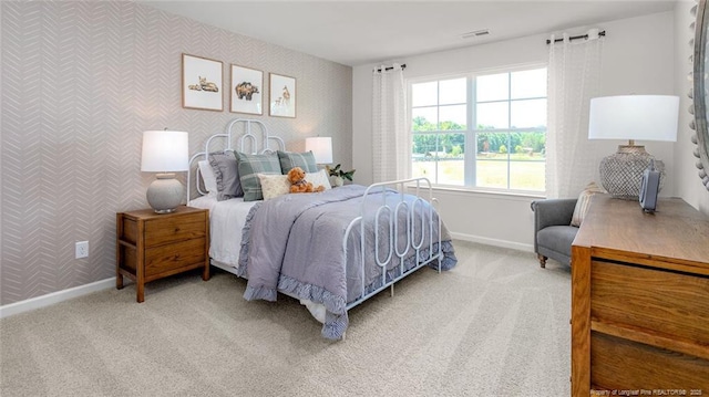 184 Hartfield Ave, Raeford, NC 28376 - carpeted bedroom with baseboards and wallpapered walls